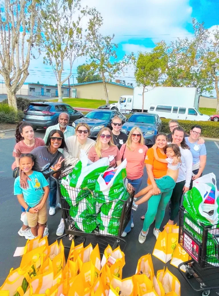 Orange Blossoms volunteers delivering holiday meals to families in Orange, CA